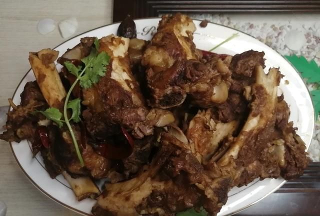 香辣牛骨头做法,香辣牛膘的做法图5
