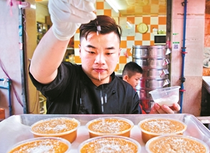 习俗丨食年糕，步步高